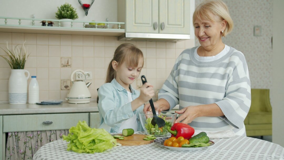 grandmother cooking with grandchild